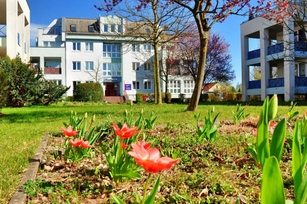 Rote Mühle Quartier im Frühling Foto von Christa-Maria Ruch